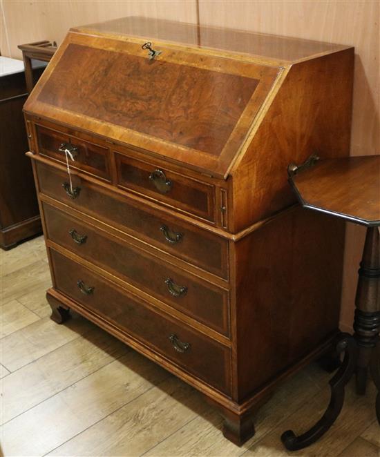 A George II-style burr walnut bureau W.92cm